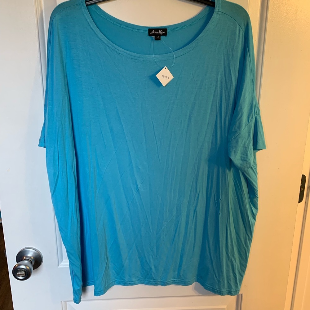 Boutique style top - bigger fitting.